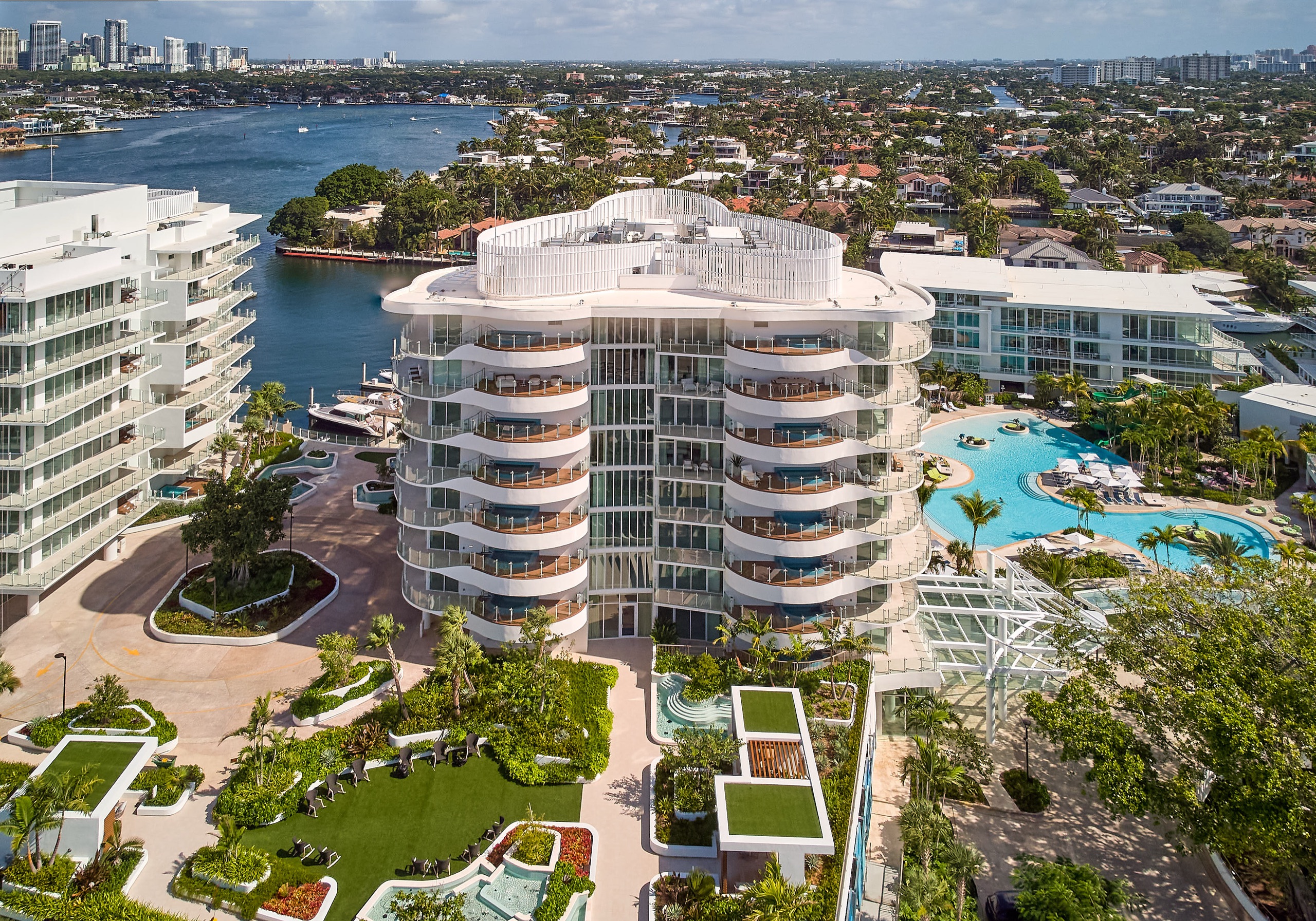 Indigo’s rooftop crown from above, the Intracoastal winding behind