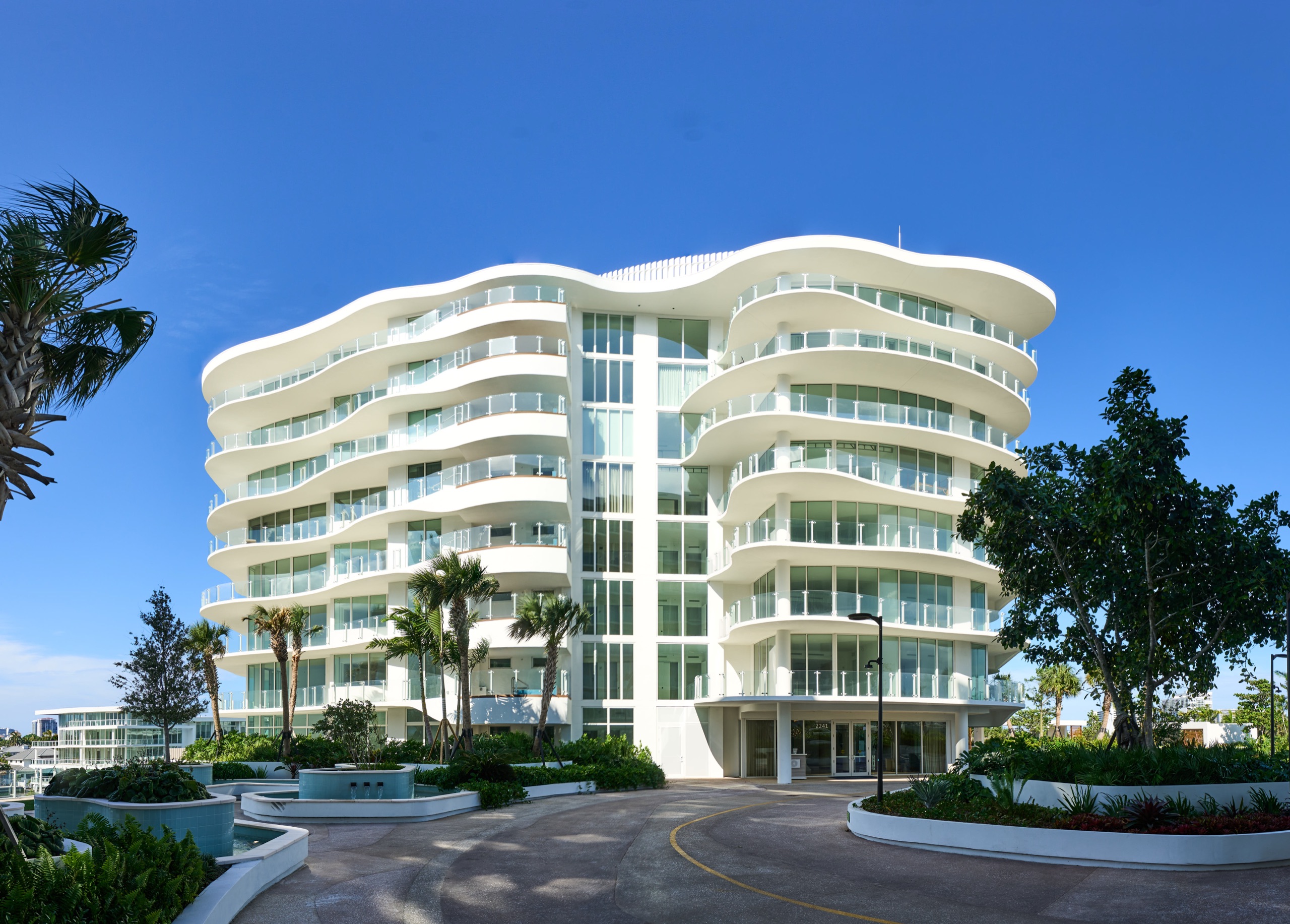 Azul photographed from the court — nine storeys of poured white waves