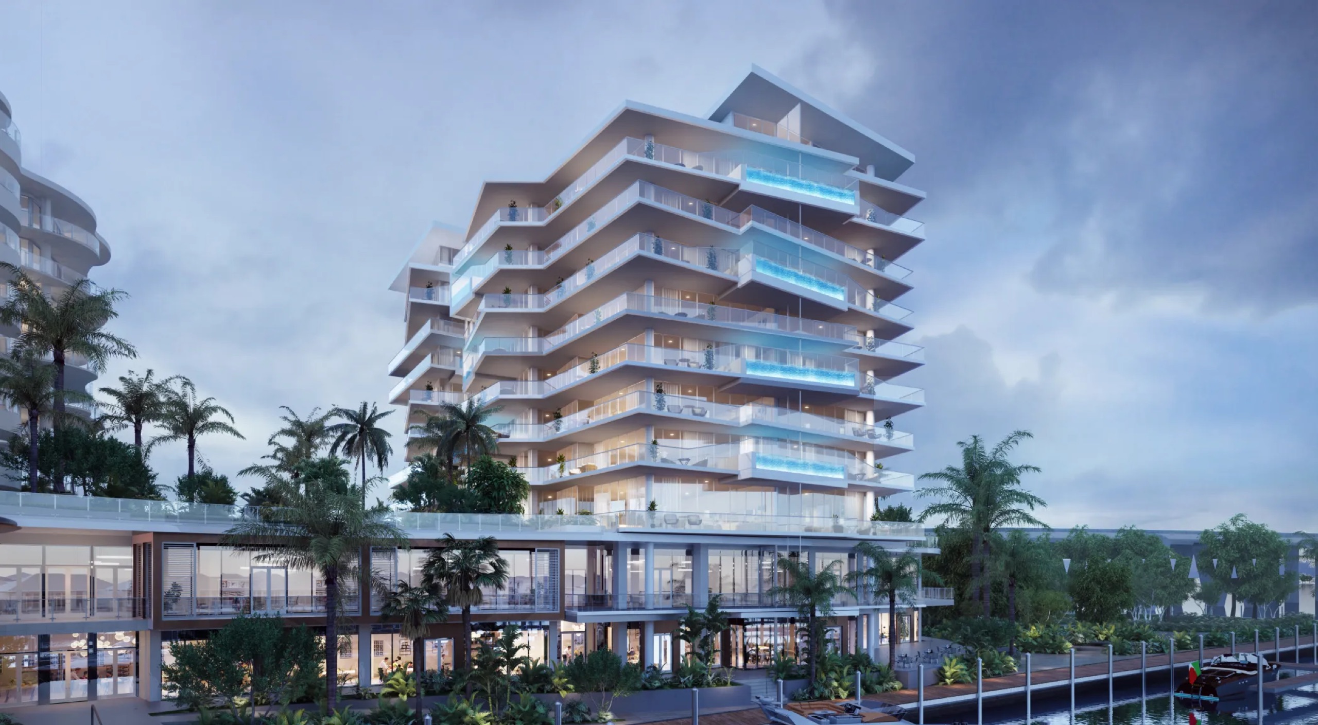 Indigo’s stacked wave balconies with private plunge pools, seen from the canal
