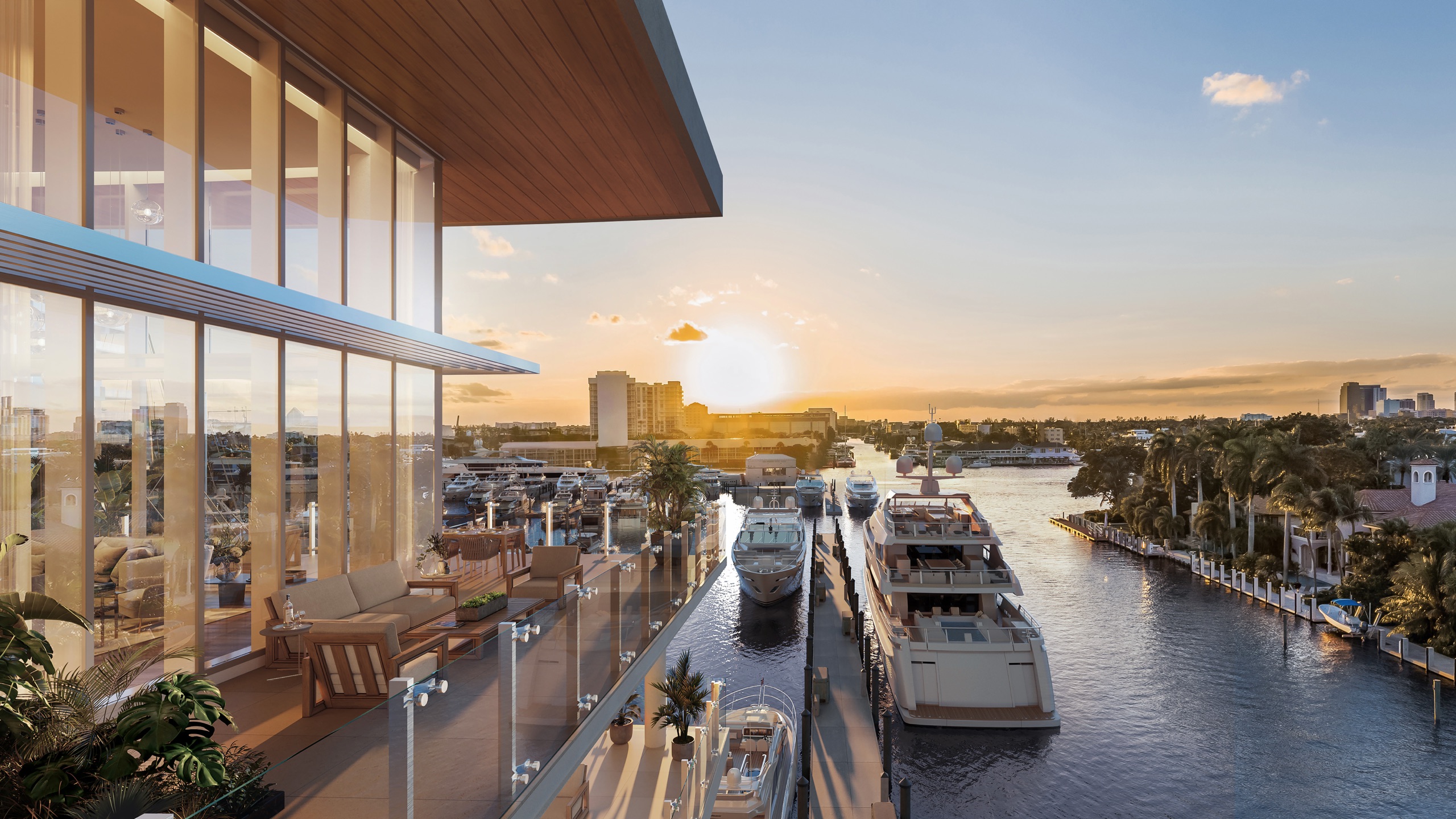 A private terrace above the superyacht channel as the sun drops